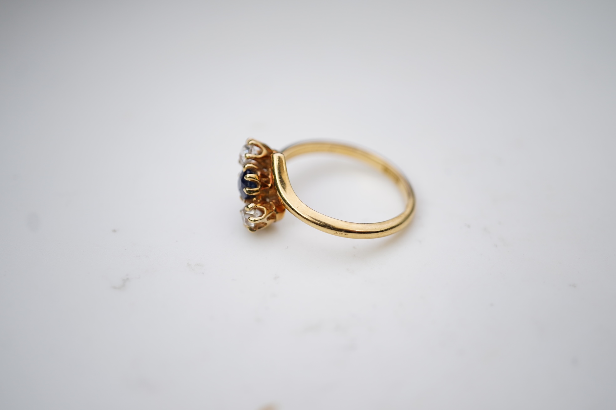 A sapphire and diamond three-stone ring, early 20th century